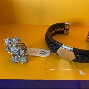 Paula Abdul circa 2000 pinky ring and leather cuff✨🖤